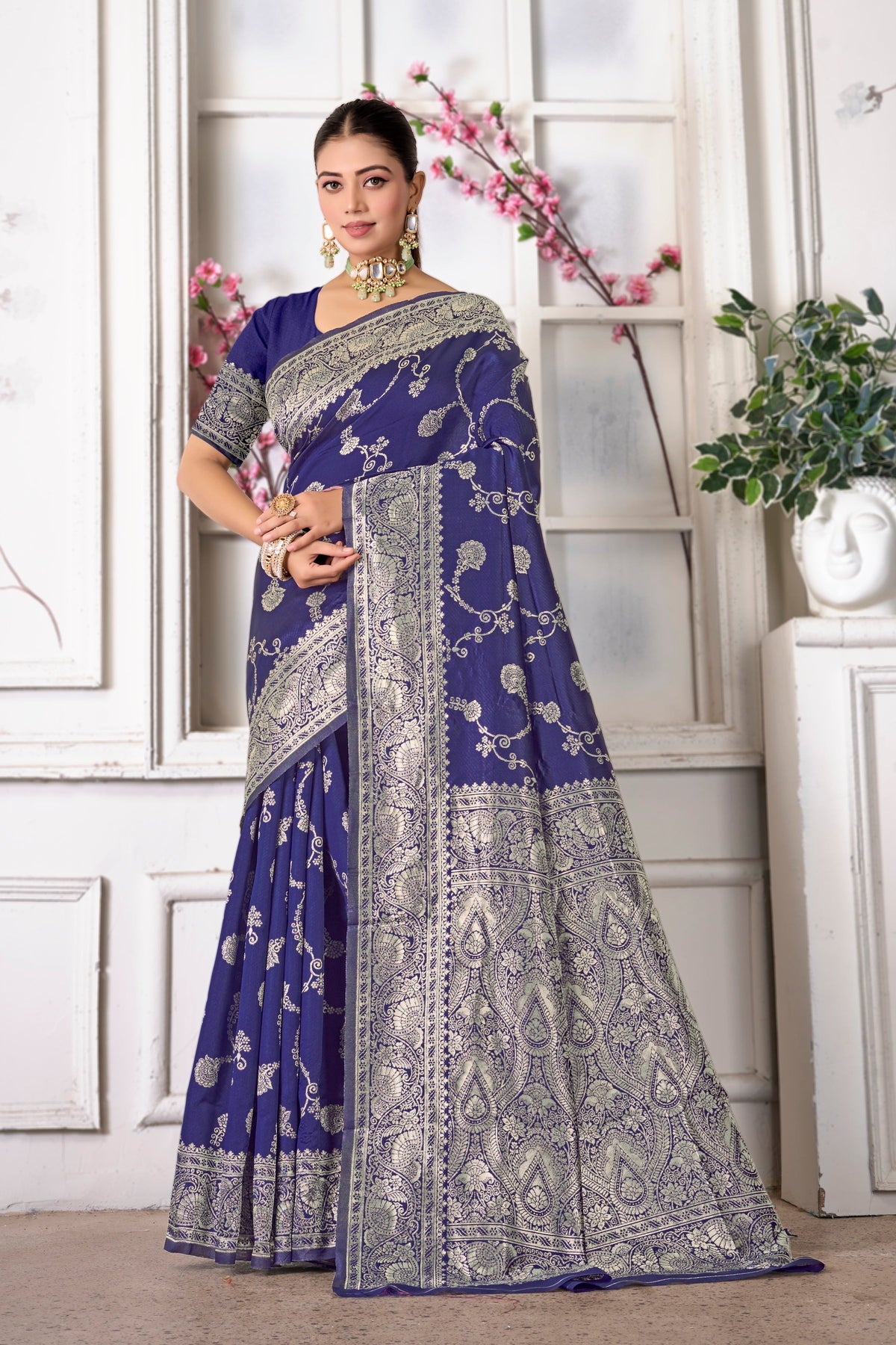 A navy blue silk Banarasi saree with silver zari