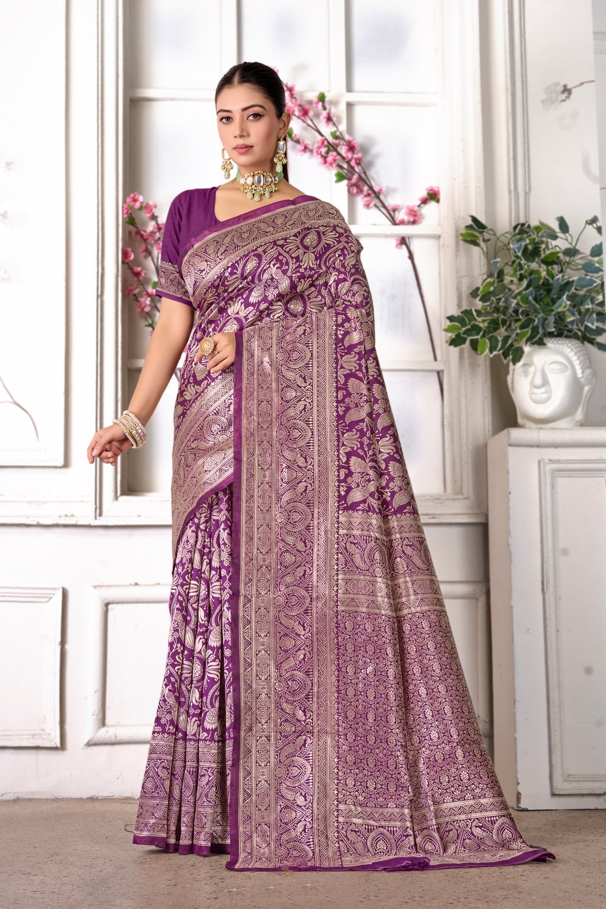 A wine silk Banarasi saree with a zari jaal