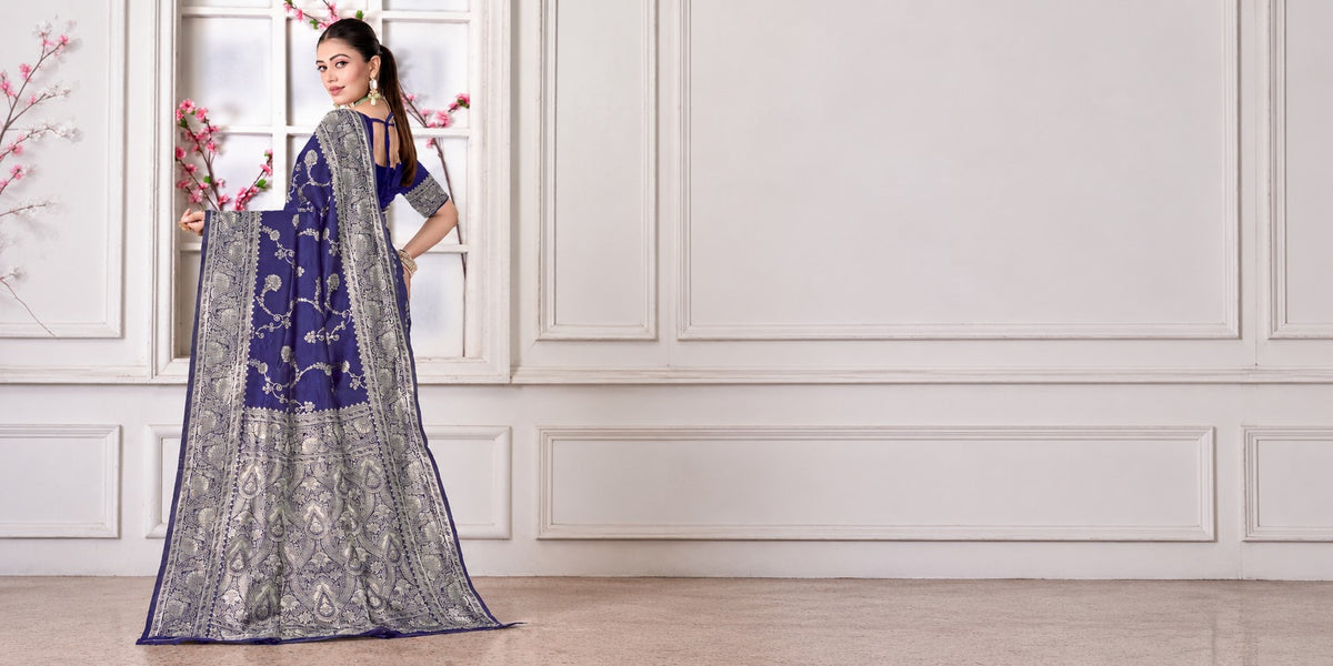 Navy blue silk woven Banarasi saree with the pallu held open