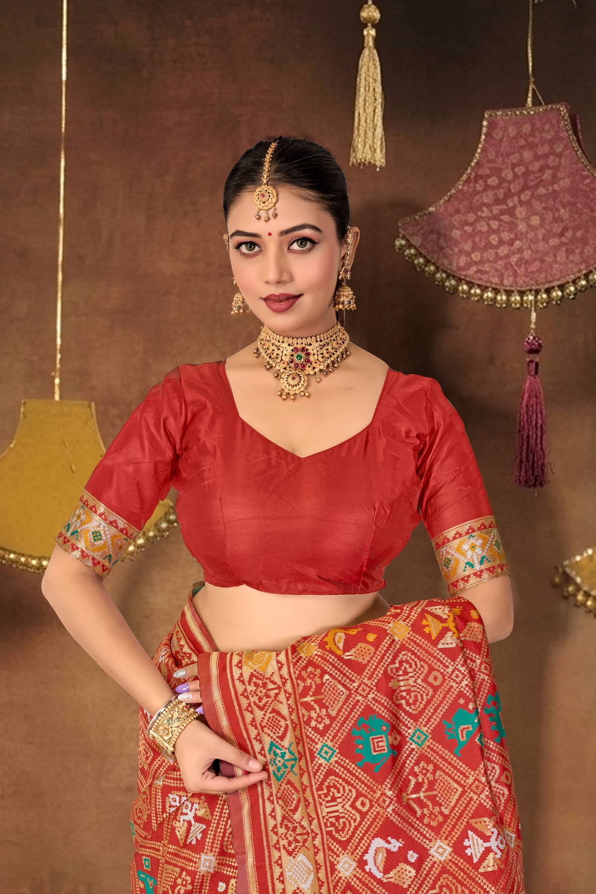 Red Silk Woven Patola Saree — blouse and border, close-up