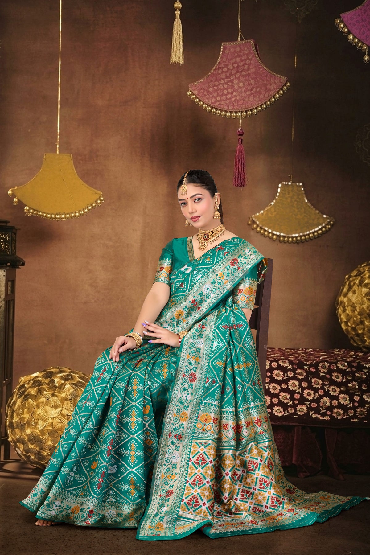 Turquoise Silk Woven Patola Saree — seated drape
