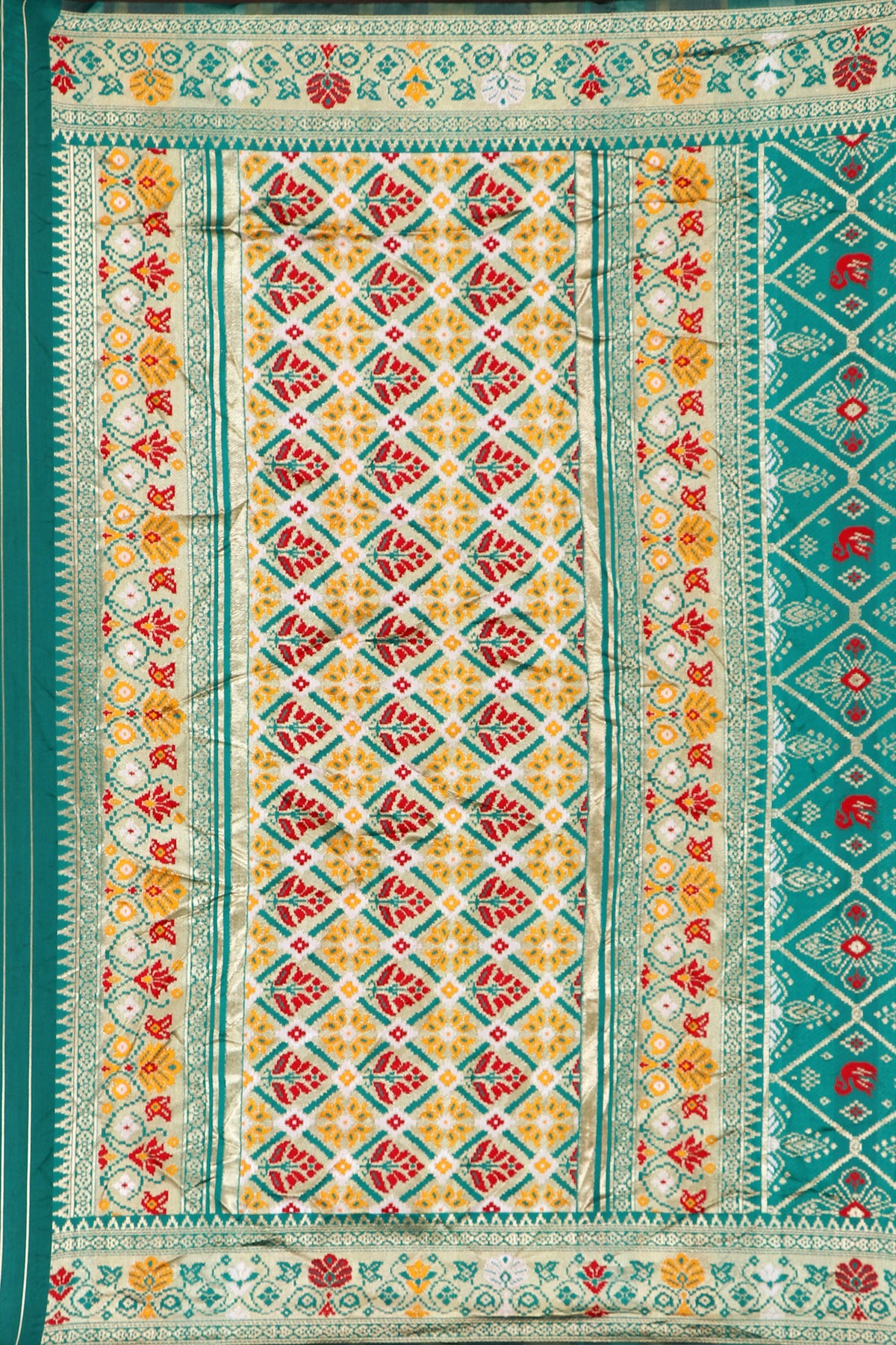 Turquoise Silk Woven Patola Saree — fabric weave, close-up