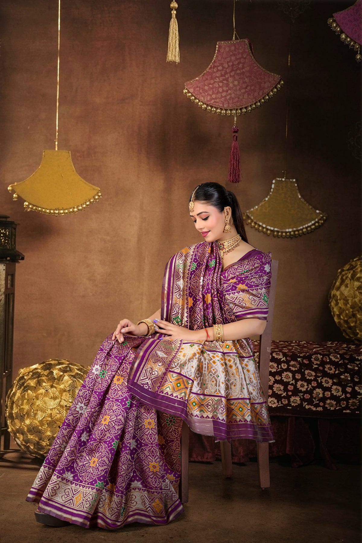 Wine Silk Woven Patola Saree — seated drape